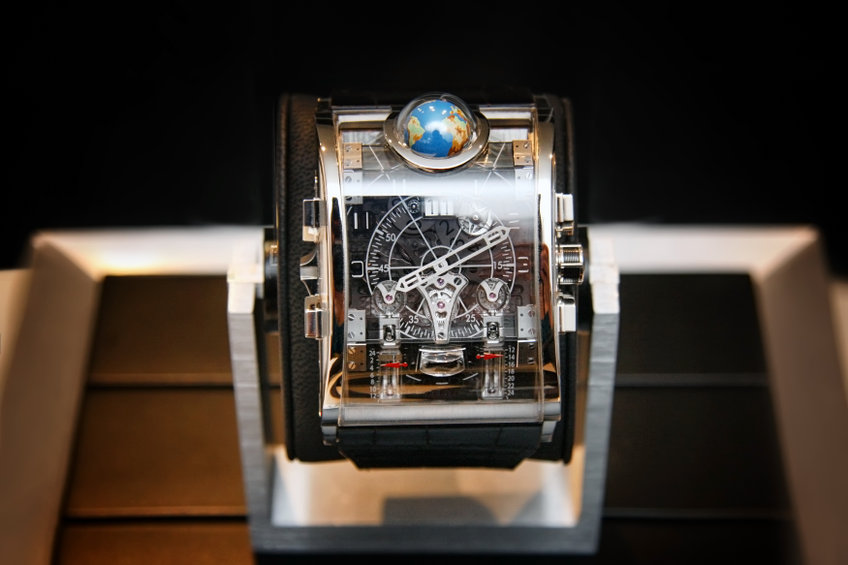 Swiss watches on blurred background of watch box